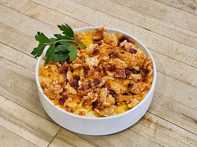 Mac N Cheese with Pork Skin Cracklins.